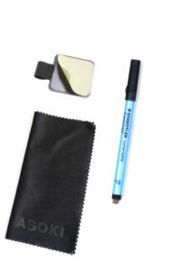 Erasable pen with erase wipe and sticky pen loop