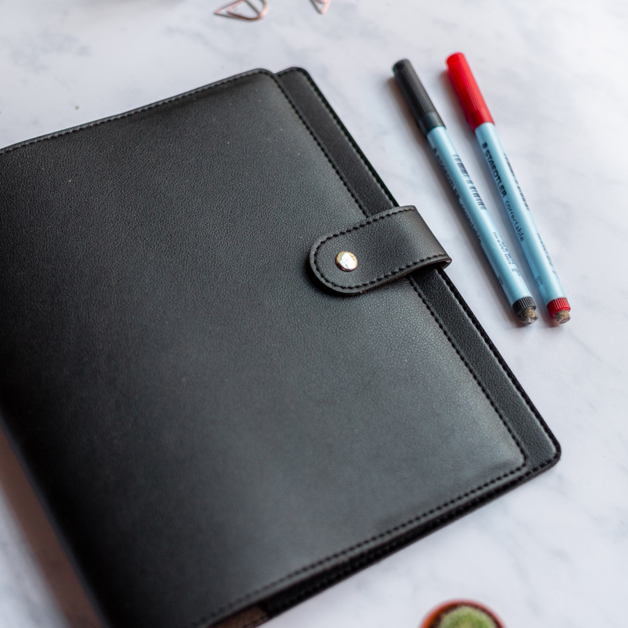 Erasable notebook with portfolio organiser